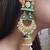 Harika Green Kundan Jhumki Earrings