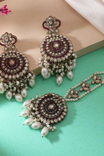Magenta color kundan earrings tikka set