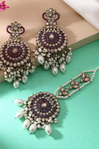 Purple color kundan earrings tikka set