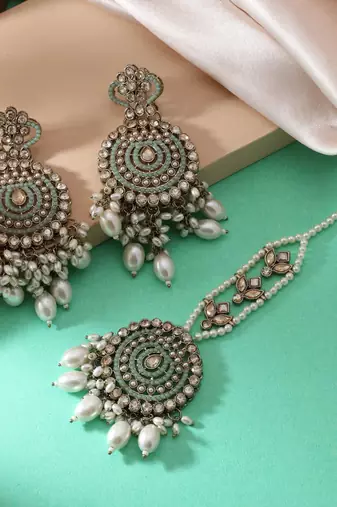 Sky blue color kundan earrings tikka set