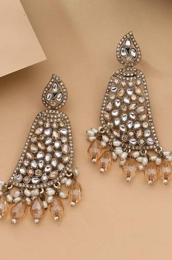 Gold color kundan earrings