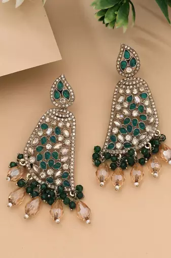 Green color kundan earrings