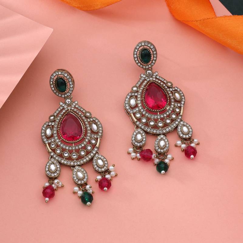 Rani & green color kundan earrings