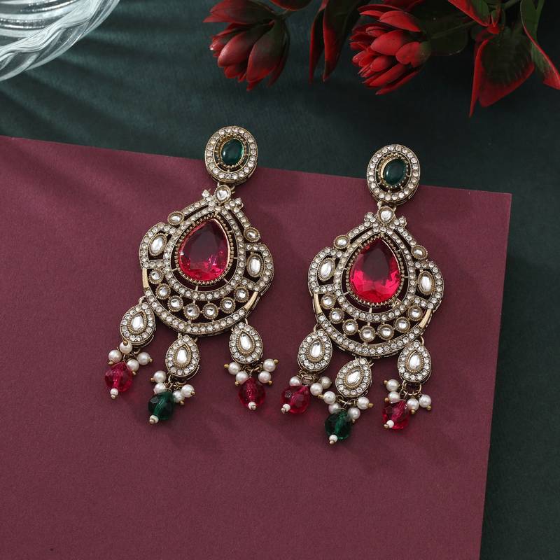 Rani & green color kundan earrings