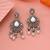 White color kundan earrings