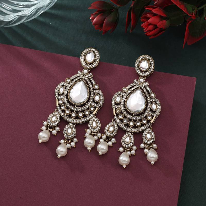 White color kundan earrings