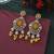 Yellow color kundan earrings