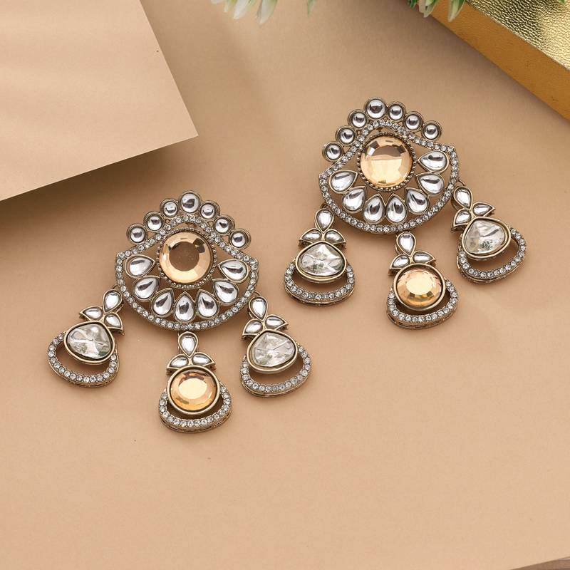 Gold color kundan earrings