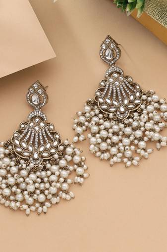 White color kundan earrings