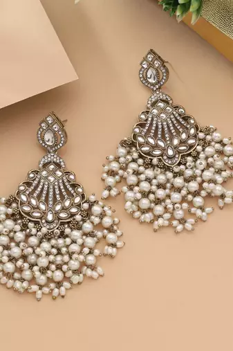 White color kundan earrings