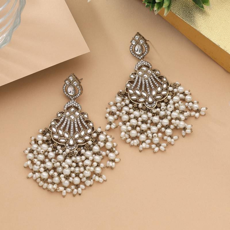 White color kundan earrings