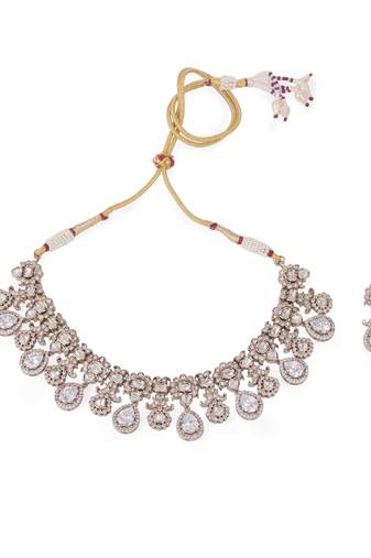Oval shape uncut kundan stone gold plated brass choker necklace set with maang tikka for women