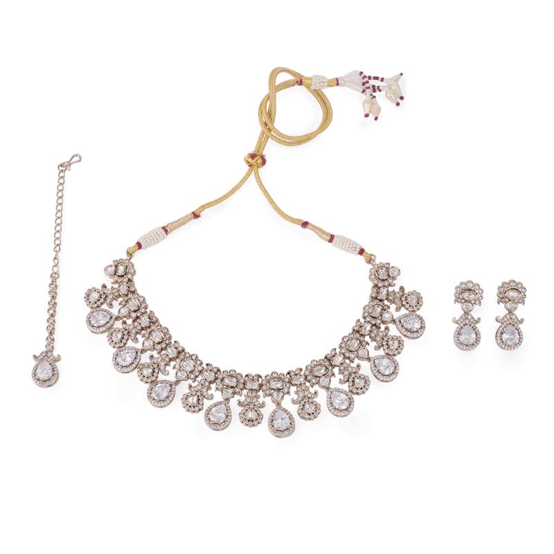 Oval shape uncut kundan stone gold plated brass choker necklace set with maang tikka for women