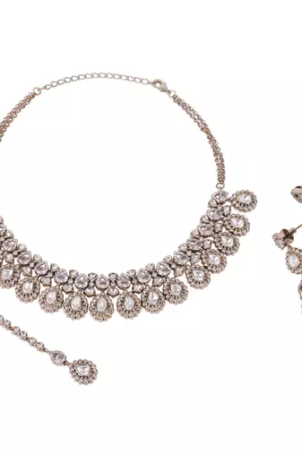 Oval shape uncut kundan stone gold plated brass choker necklace set with maang tikka for women