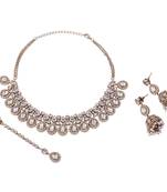 Oval shape uncut kundan stone gold plated brass choker necklace set with maang tikka for women