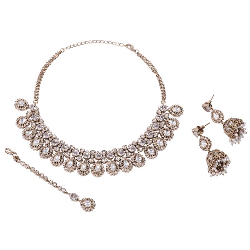 Oval shape uncut kundan stone gold plated brass choker necklace set with maang tikka for women