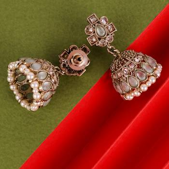 sky blue alloy jhumki with antique gold kundan stones 4