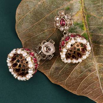 Elegant oval shape pink uncut kundan stone antique gold plated jhumki earring for women and girls 3