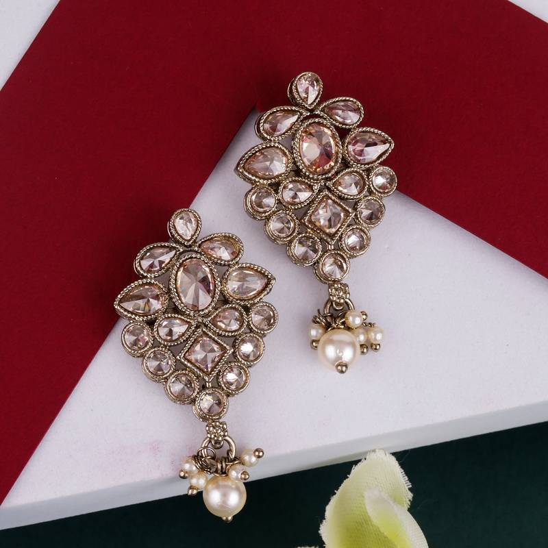 Flower design brown uncut kundan stone mother of pearl antique gold plated dangle earring for women