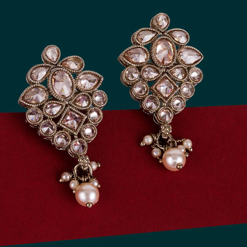 Flower design brown uncut kundan stone mother of pearl antique gold plated dangle earring for women
