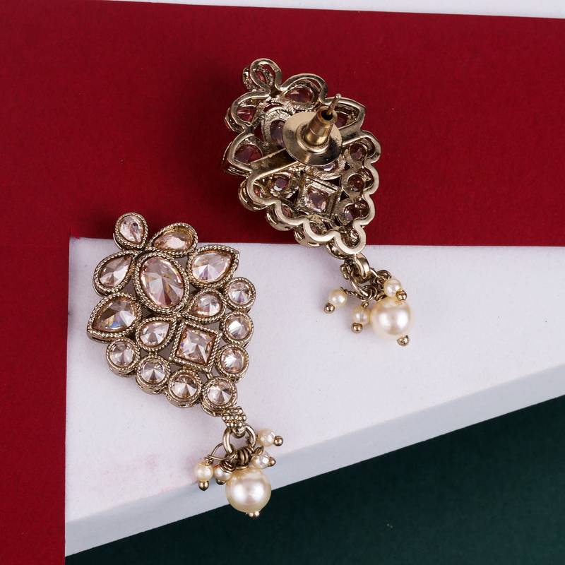 Flower design brown uncut kundan stone mother of pearl antique gold plated dangle earring for women