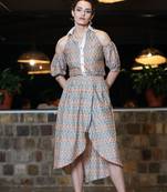 Coral and jade ikat tulip skirt & cold shoulder shirt co-ord set