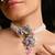 Pearl necklace withcolourful crystal flower bunch pendant