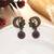 Purple color oxidised earrings
