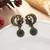 Green color oxidised earrings