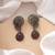 Purple color oxidised earrings