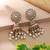 White color kundan earrings