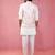 men's peach silk nehru jacket with cream kurta pyjama - designer festive set