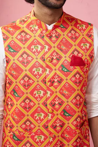 Orange patola print nehru jacket with cream kurta pyjama - festive set
