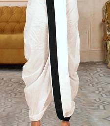 White dupon art silk kurta, jacket with matching dhoti and churidar