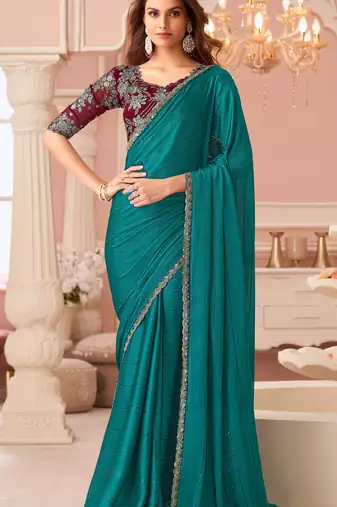 Turquoise chiffon embroidered party-wear-sarees with bridal embroiderd blouse