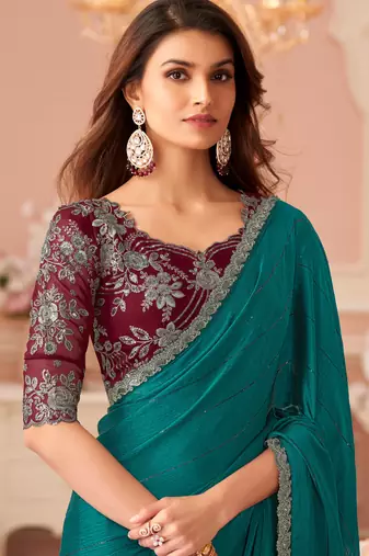 Turquoise chiffon embroidered party-wear-saree with bridal embroiderd blouse