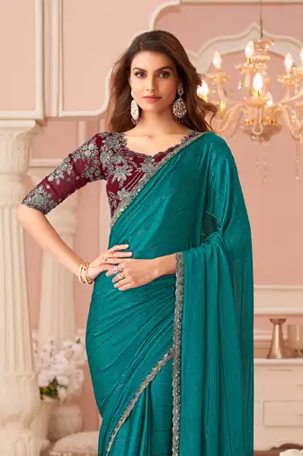 Turquoise chiffon embroidered party-wear-saree with bridal embroiderd blouse