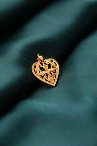 Gold-plated heart pendant with cross design