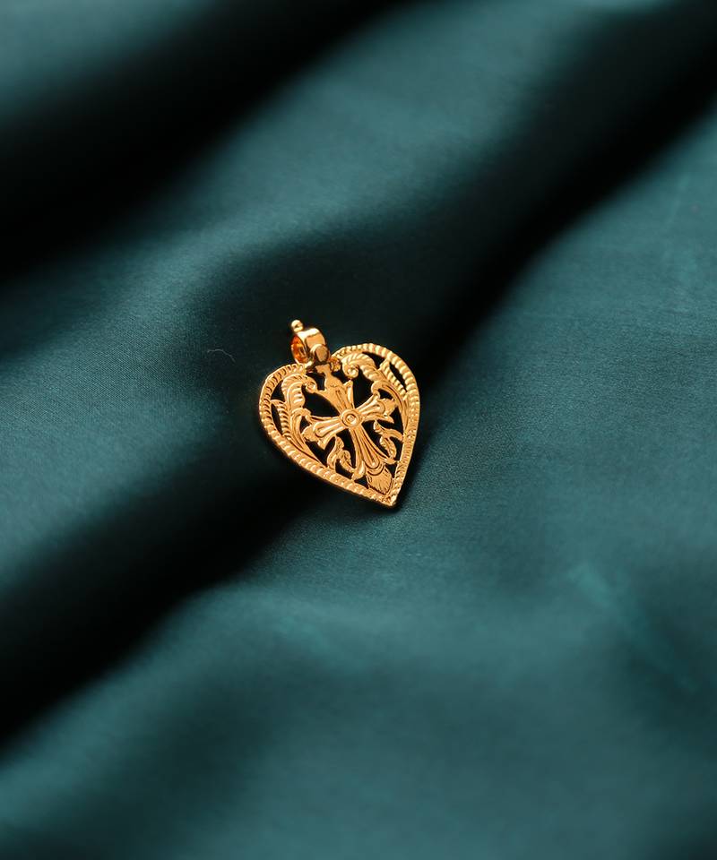 Gold-plated heart pendant with cross design