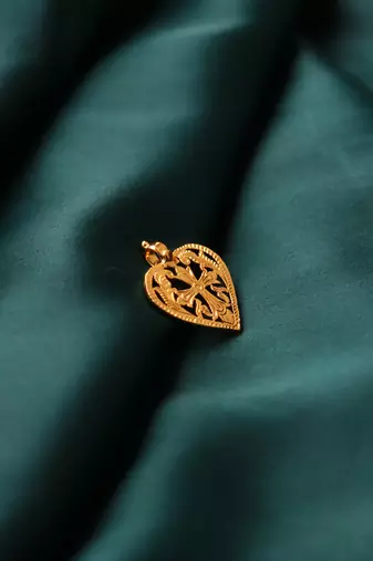 Gold-plated heart pendant with cross design