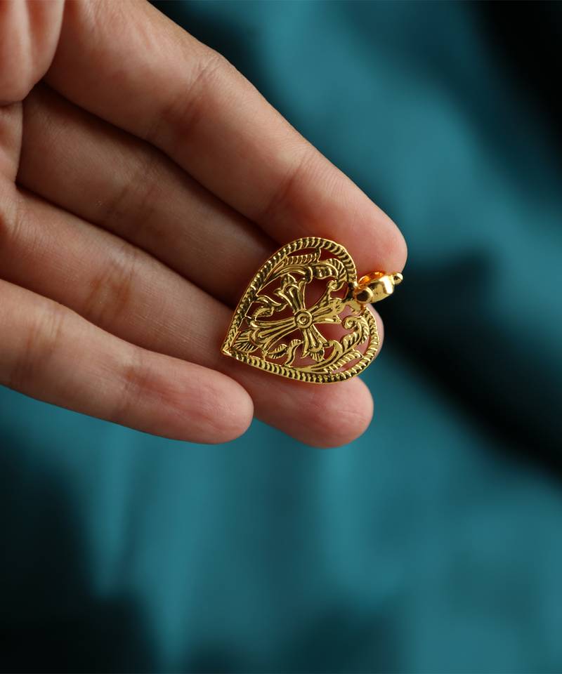 Gold-plated heart pendant with cross design