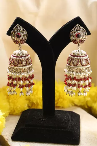Gold jhumkas with red and white rice pearls