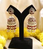 Gold jhumkas with red and white rice pearls