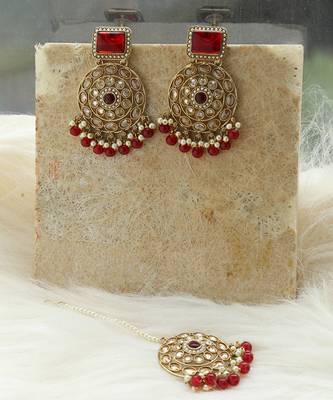 Kundan danglers with red beads and stone accents 3