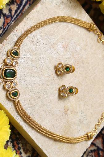 Gold-tone necklace with green & white stone 