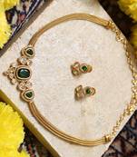 Gold-tone necklace with green & white stone 