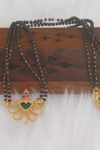 Gold plated kerala style black beads necklace