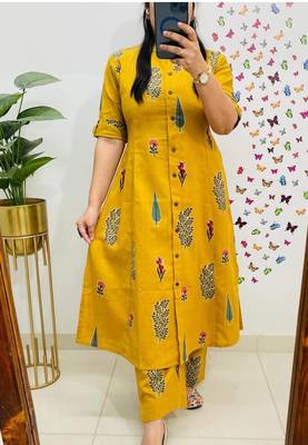 floral printed yellow round neck  cotton a-line kurta with trouser 1