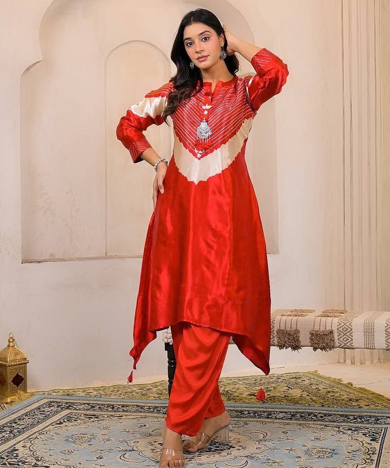 Aaysa floral printed orange round neck muslin a-line kurta with trouser