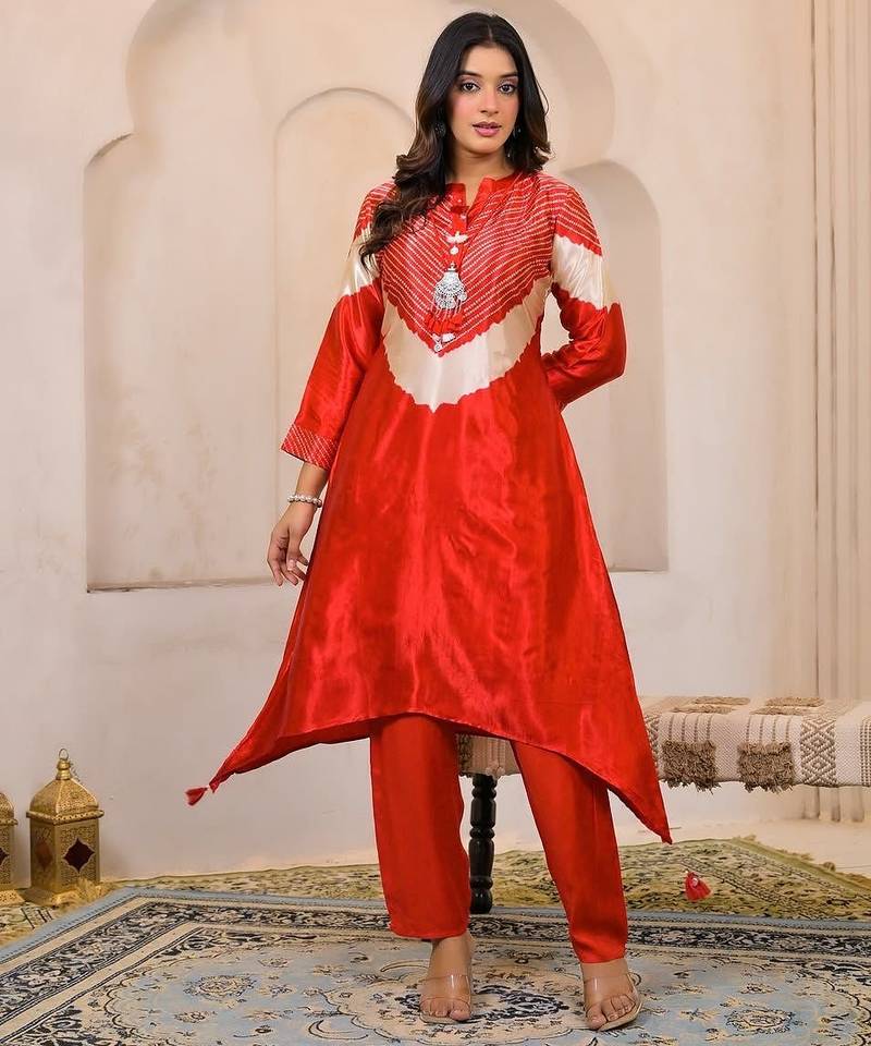 Aaysa floral printed orange round neck muslin a-line kurta with trouser
